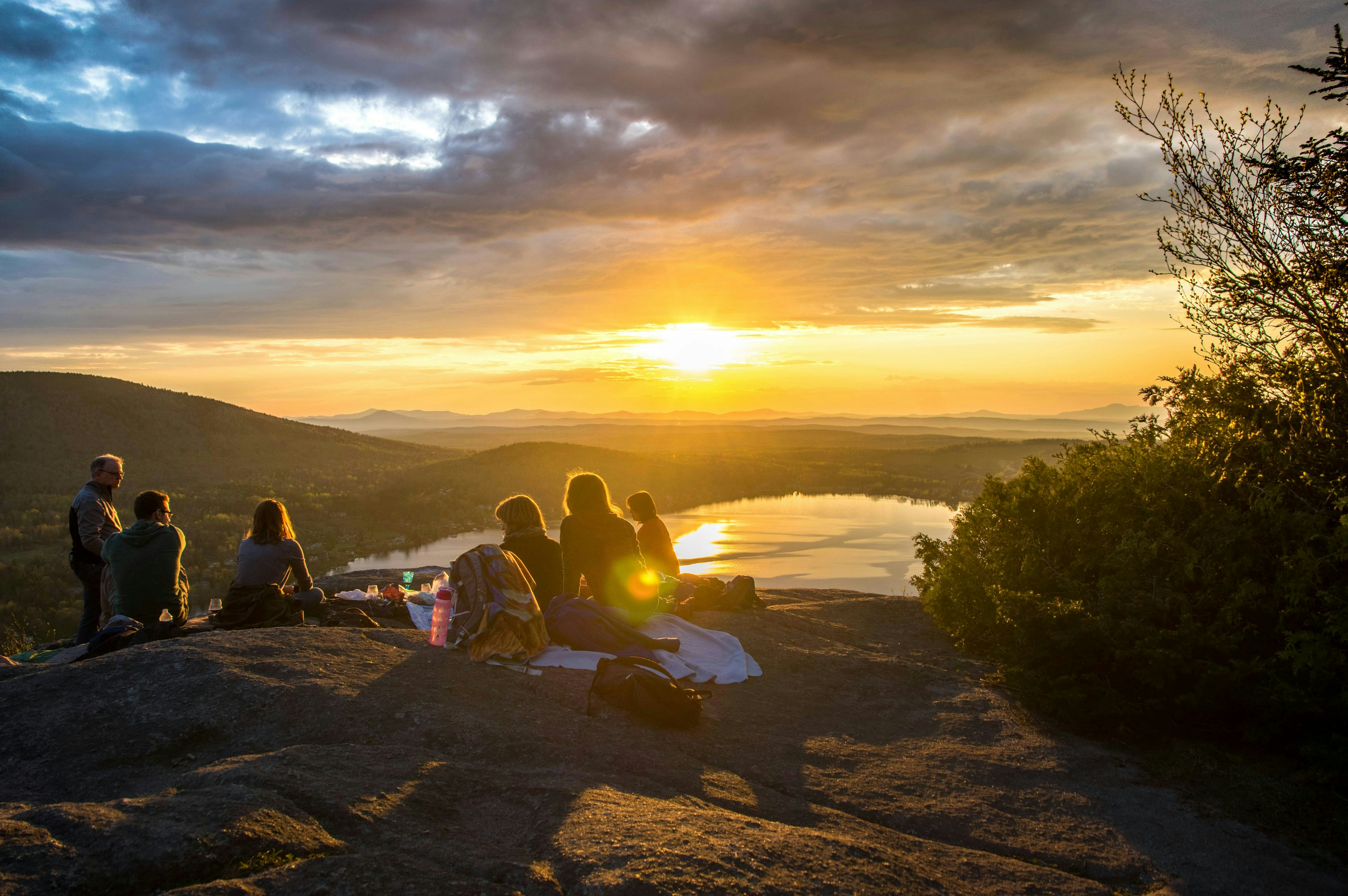 group of people enjoying sunset